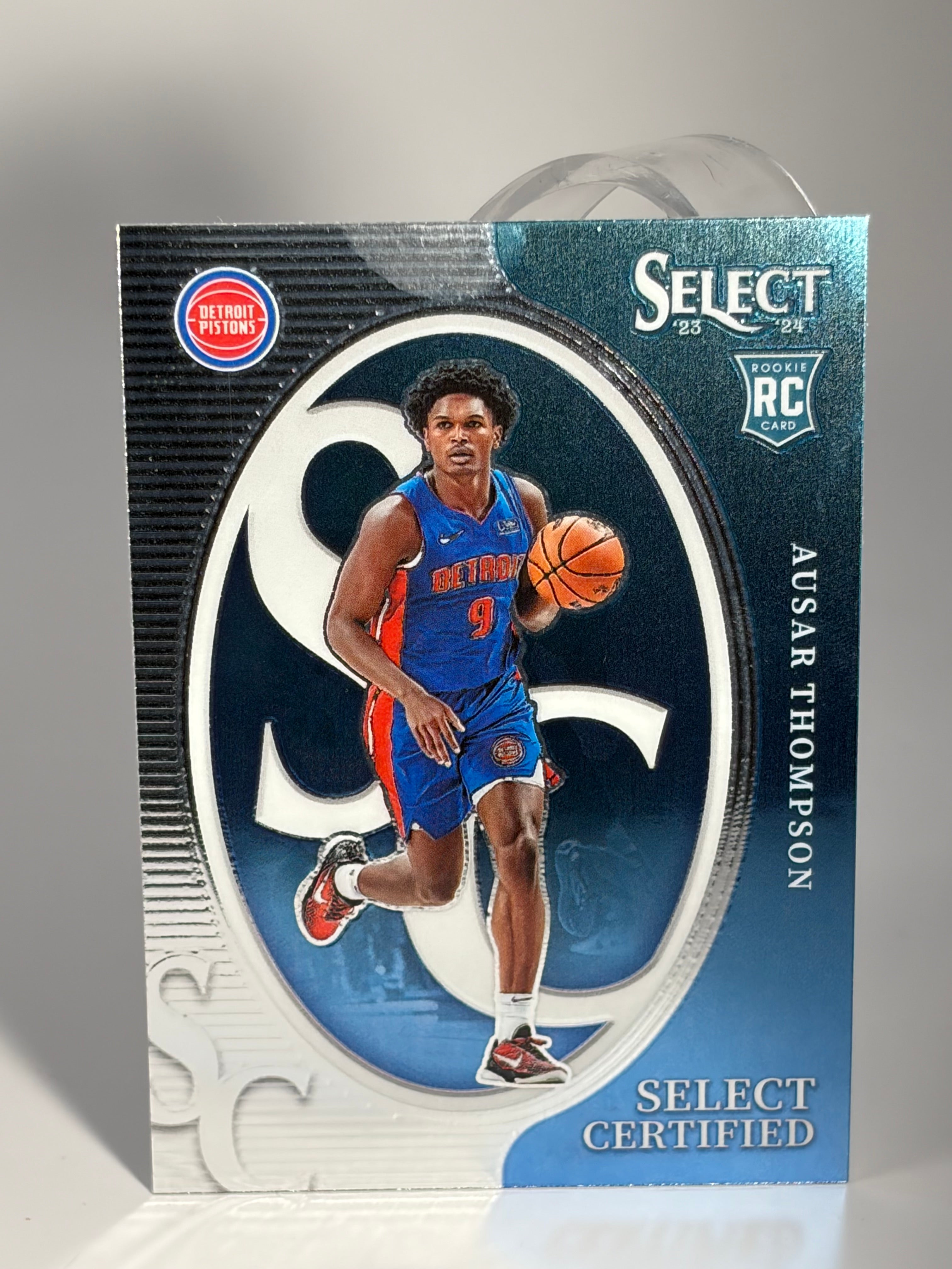 Basketball trading card of Ausar Thompson on a gray background