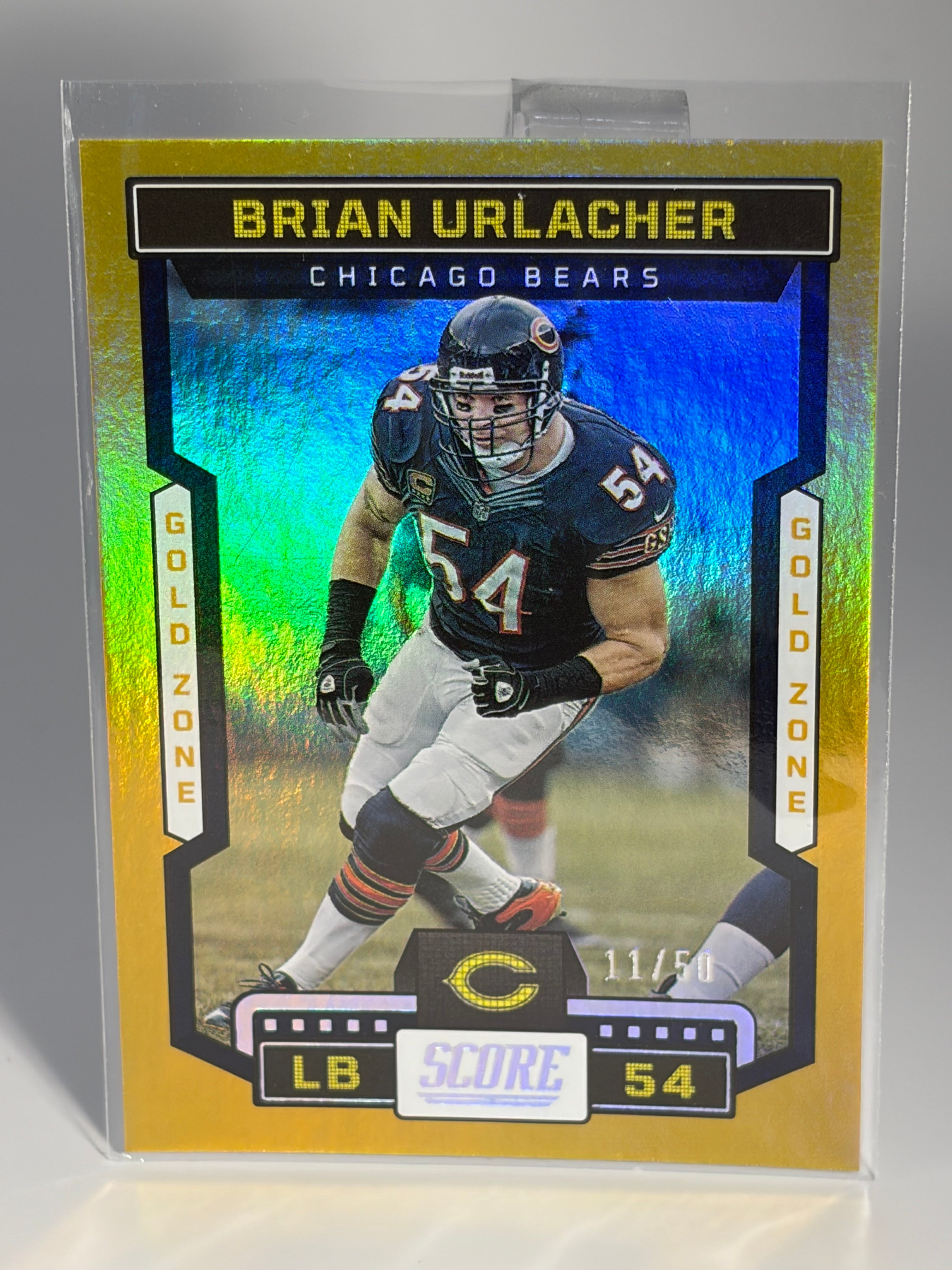Football trading card of Brian Urlacher with gold and blue gradient