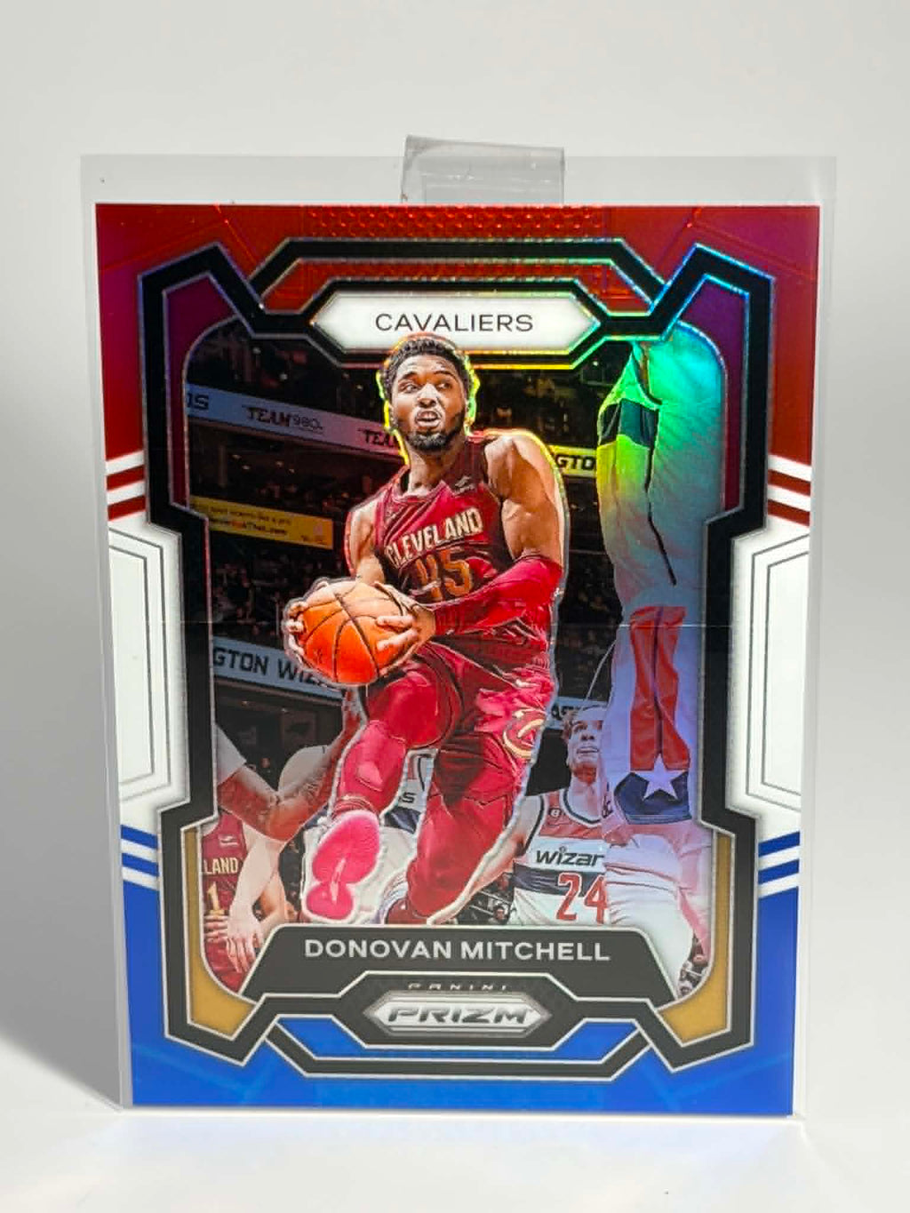 Basketball trading card of Donovan Mitchell with colorful border and 'Cavaliers' branding.