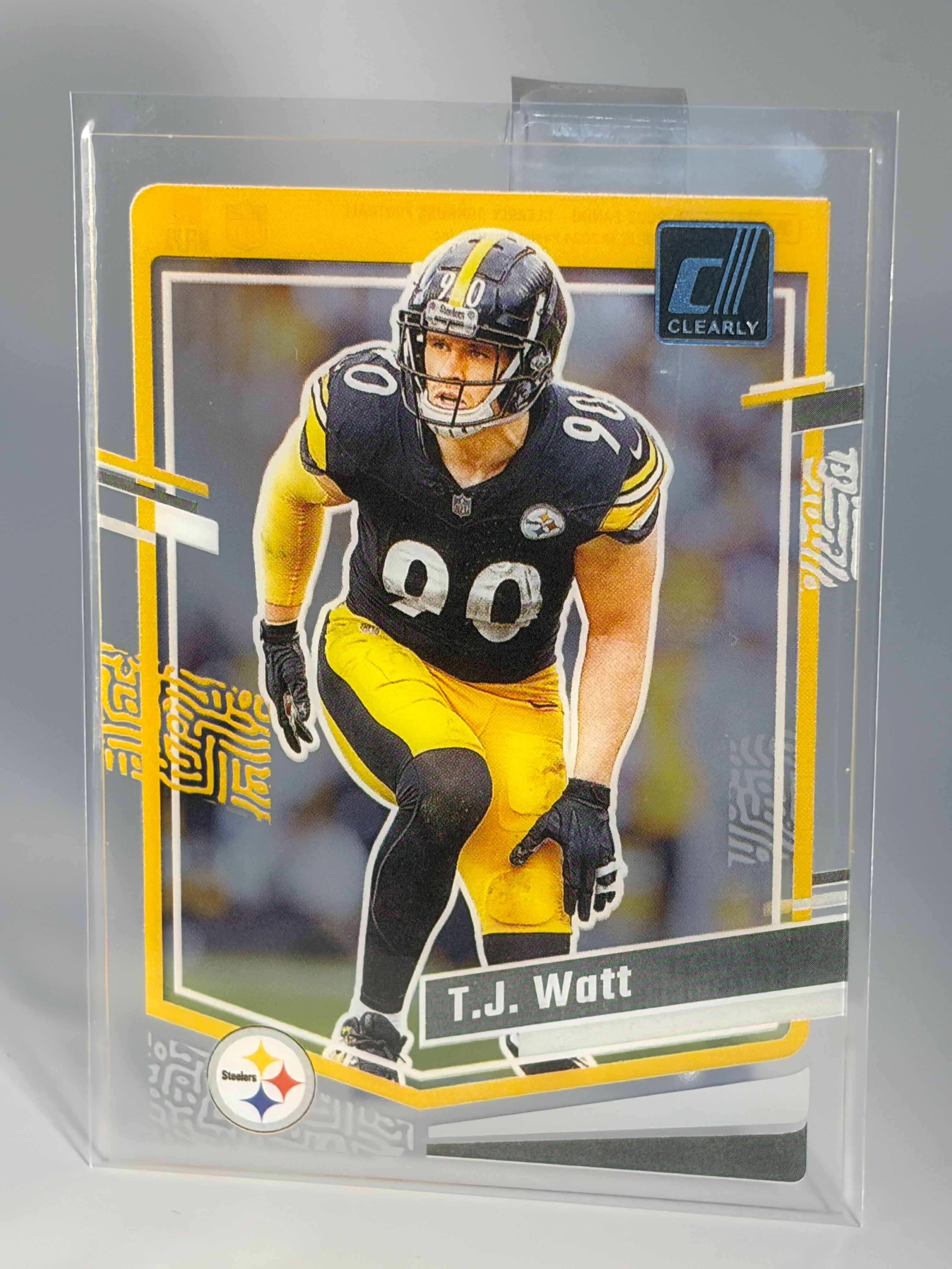 Football trading card of T.J. Watt in a clear protective case
